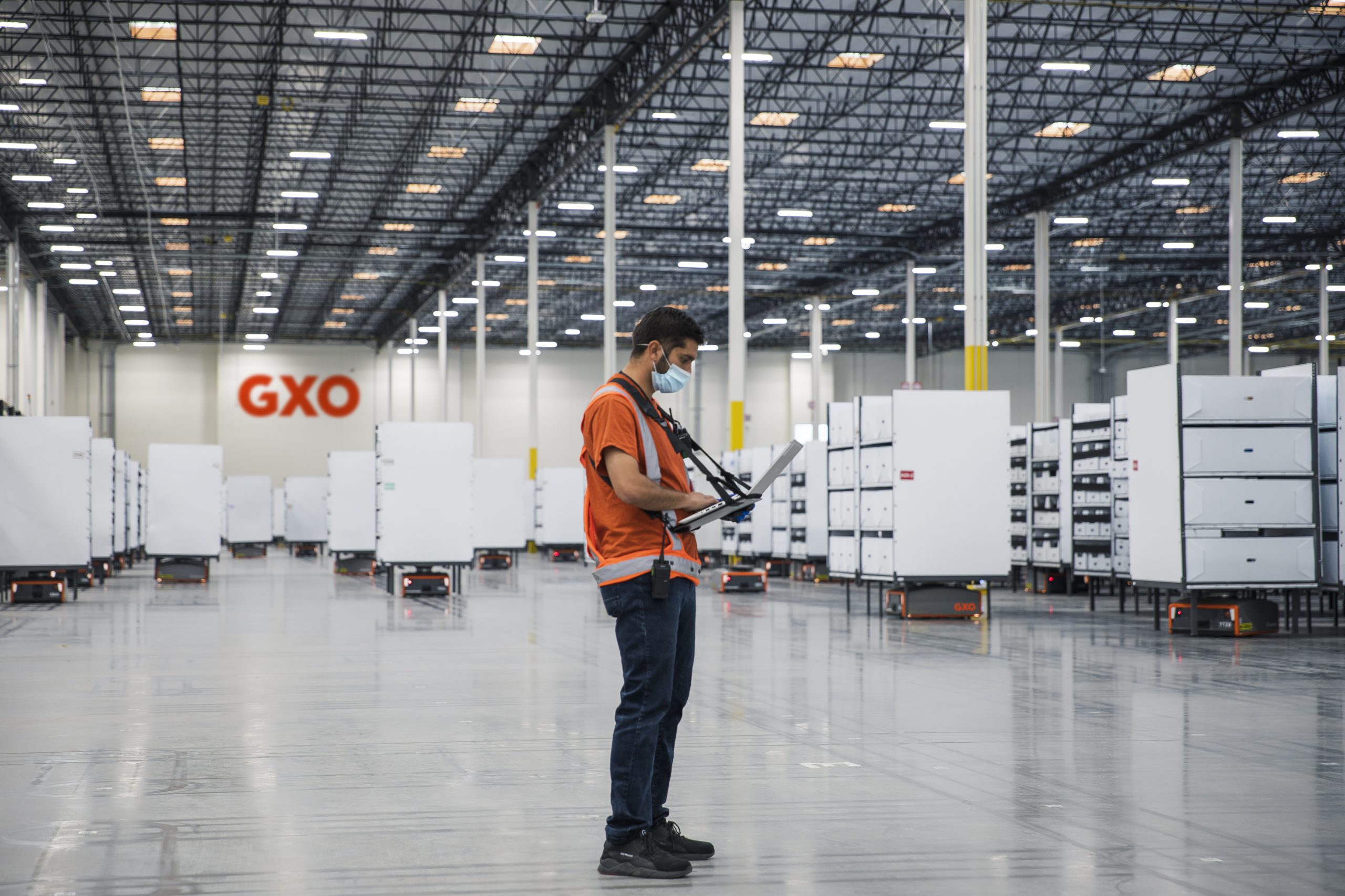 GXO employee in warehouse